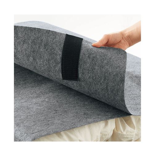面テープ付きのベルトで寝具や衣類をやさしく圧縮・収納。